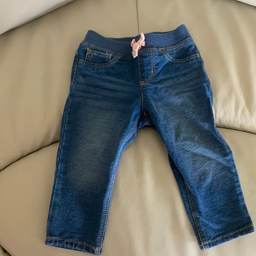 Never worn. Size 12M